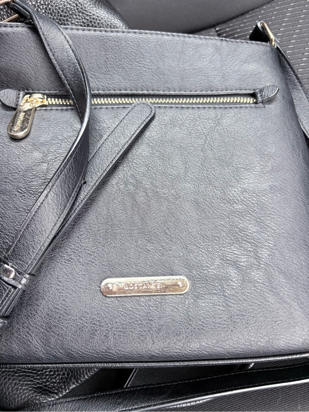Black Crossbody Bag with Front Zip and Branded Plaque